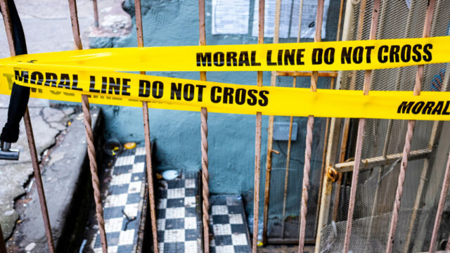 Bright yellow tape stretched across a rusted metal railing reads “MORAL LINE DO NOT CROSS,” turning a worn basement entrance with checkerboard steps, cracked concrete, and a battered security door into a sharp piece of urban social commentary.